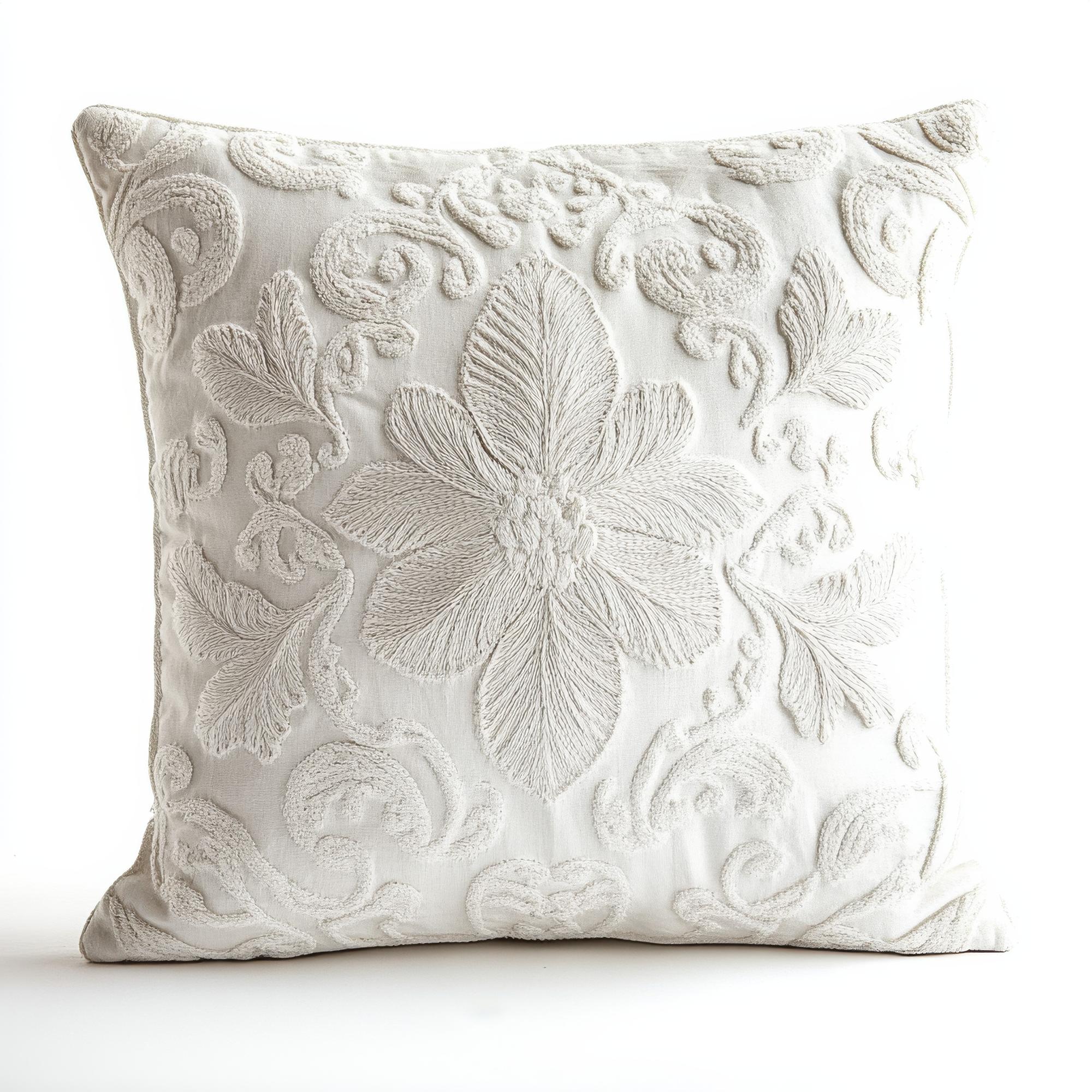 Embroidered linen cushion with floral motif